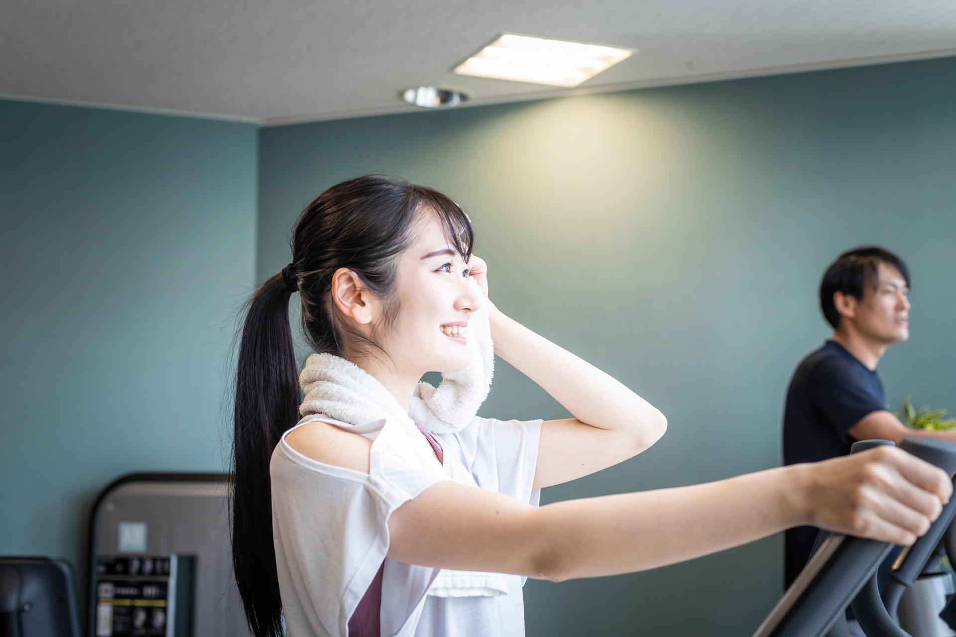 安心して運動を続けられ前向きな表情になる女性のイメージ